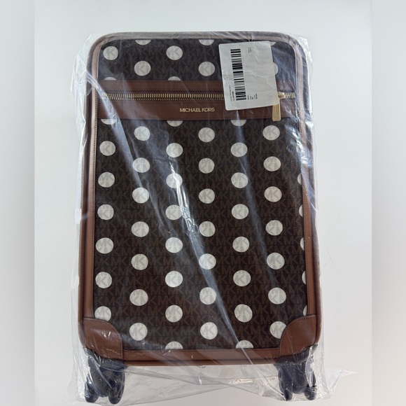 MICHAEL KORS  Small Polka Dot Signature Logo Suitcase
$898 OUT OF STOCK - Picture 7 of 12